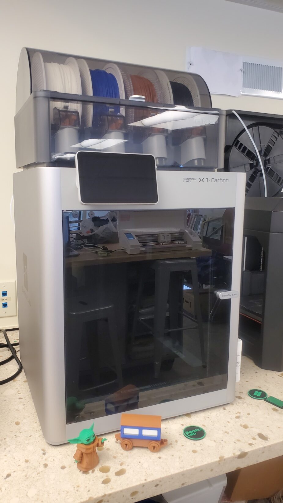 Thanks to a generous donation, the MakerSpace at Defiance Public Library has a new 3D printer, the Bambu Labs Carbon X1, which prints multiple colors, & at a higher resolution than the MakerBot.